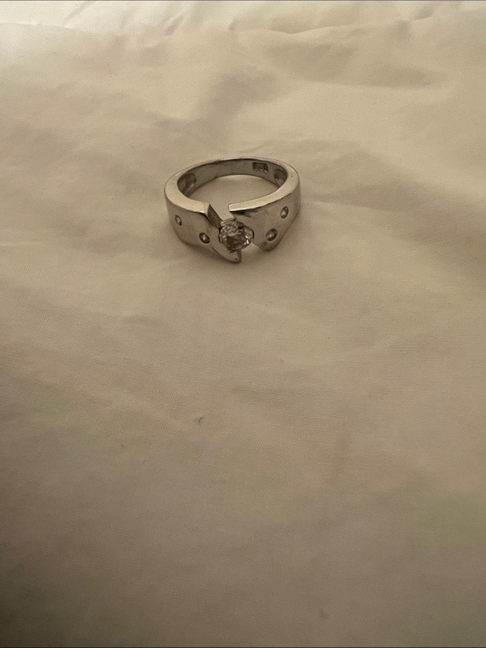 Polished Silver Solitaire Ring with Clear Center Stone